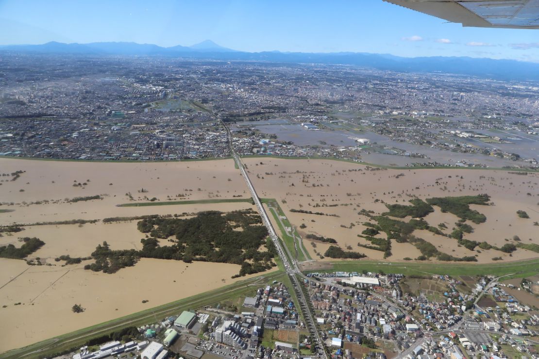 This aerial view shows the swollen Arakawa river in the aftermath of Typhoon Hagibis dividing Tokyo and Saitama prefecture on October 13, 2019.