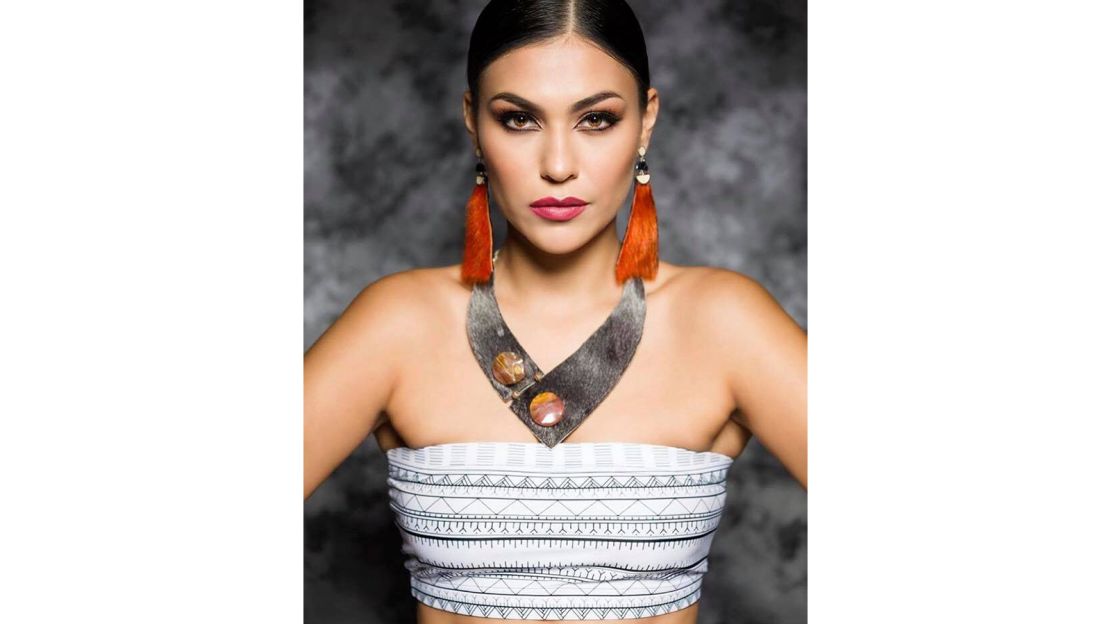 Customers around the world are buying clothing that reflects traditional Inuit markings, such as this top by Martha Kyak, an Inuit historian and fashion designer with Inuk Chic.  