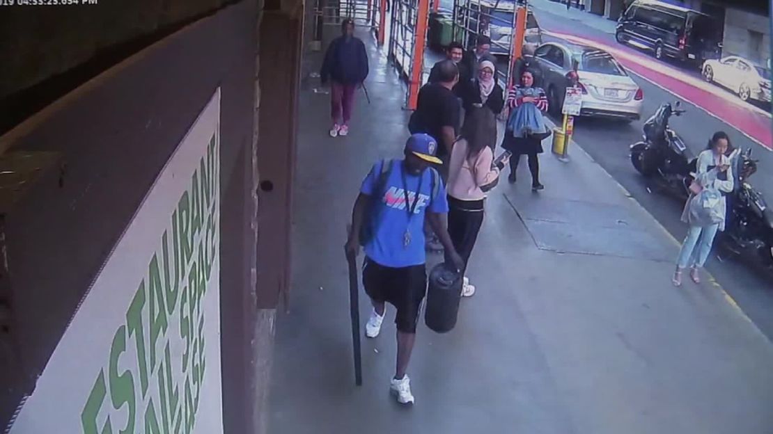 Surveillance video shows a man walking away with the etching.