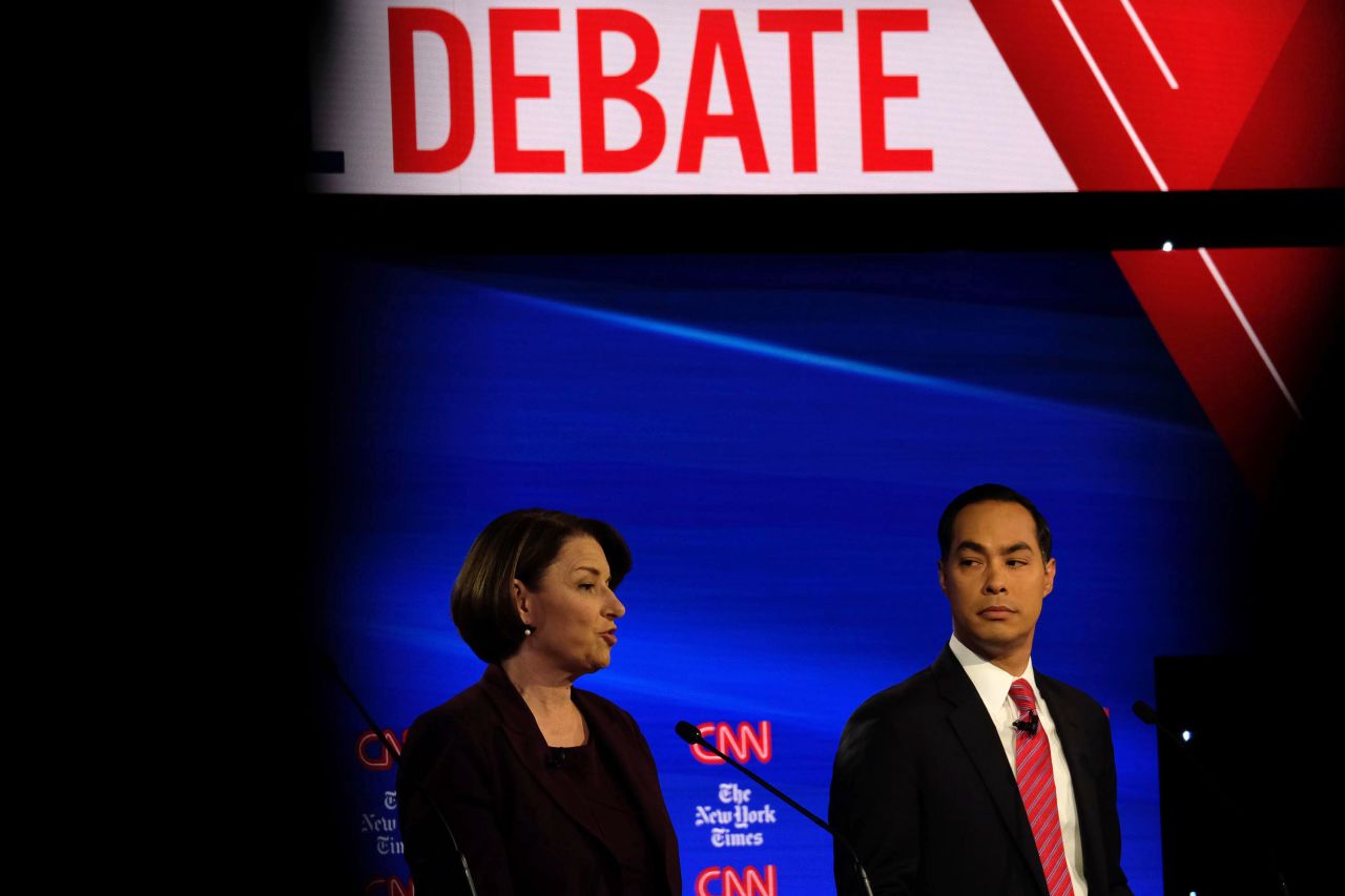 Klobuchar and Castro during the first half of the debate.