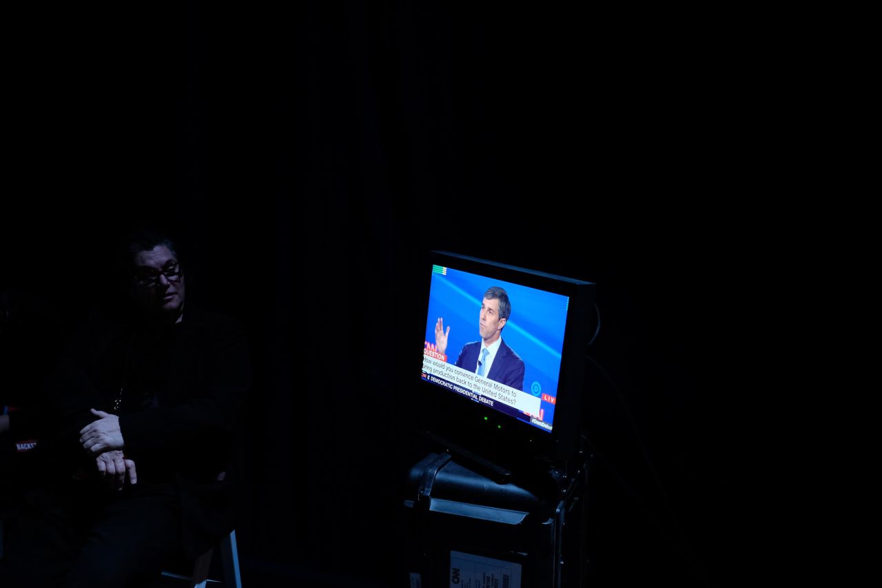 O'Rourke is seen on a television monitor backstage.