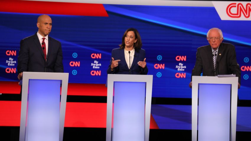 Presidential candidates Cory Booker, Kamala Harris and Bernie Sanders participate in the Democratic debate co-hosted by CNN and The New York Times in Westerville, Ohio, on Tuesday, October 15.