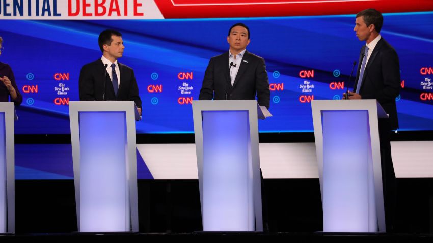 Presidential candidates Pete Buttigieg, Andrew Yang and Beto O'Rourke participate in the Democratic debate co-hosted by CNN and The New York Times in Westerville, Ohio, on Tuesday, October 15.