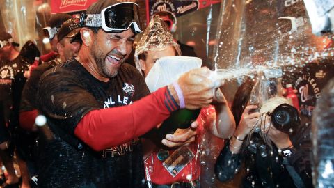 Washington Nationals manager Dave Martinez celebrates after Game 4 of the baseball National League Championship Series.