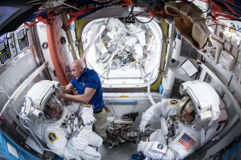 NASA spacewalkers prepare for a seven hour and one minute spacewalk during which they upgraded the station's batteries to newer, more powerful lithium-ion batteries.
