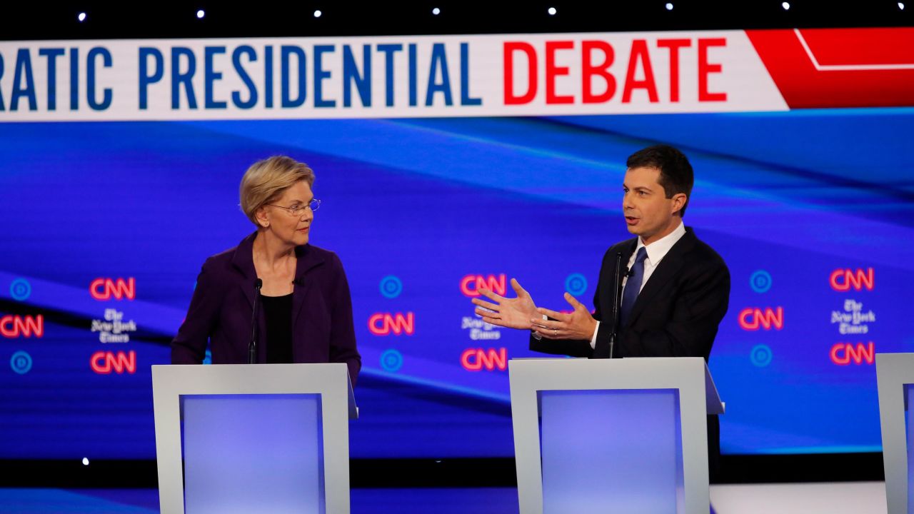 Presidential candidates Elizabeth Warren and Pete Buttigieg participate in the Democratic debate co-hosted by CNN and The New York Times in Westerville, Ohio, on Tuesday, October 15.
