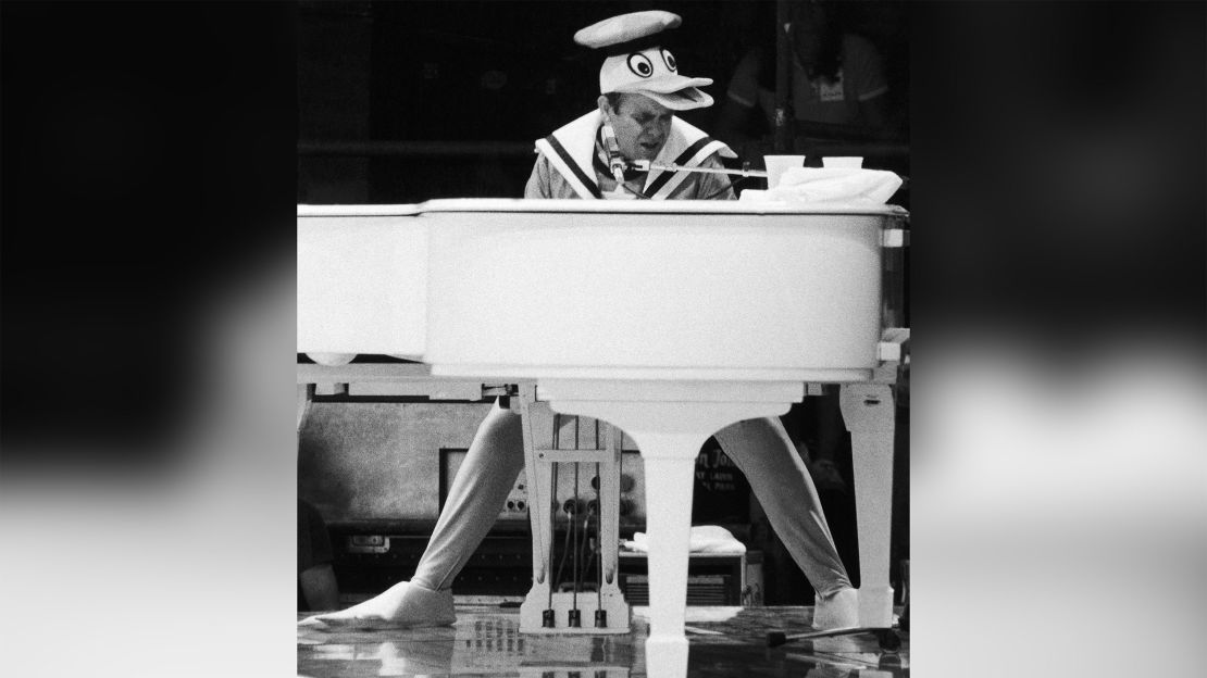 Elton John, as Donald Duck, performs a free concert in September 1980 in New York's Central Park. 