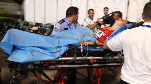 Turkey's Fadime Çelik is stretchered away from the marathon at the World Championships.