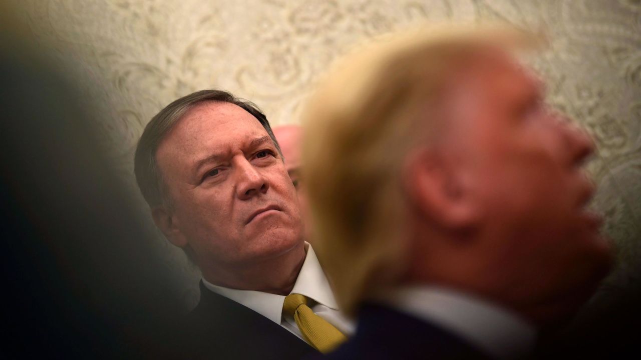 US Secretary of State Mike Pompeo attends a meeting between President Donald Trump and Italian President Sergio Mattarella (not pictured) in the Oval Office of  the White House in Washington, DC, on October 16, 2019.