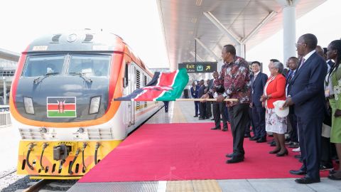 Kenyan President Uhuru Kenyatta unveils a railway project in 2019. Kenyatta has assured citizens they will receive their second vaccine doses, but some Kenyans are concerned about supply.