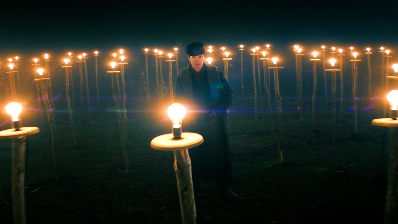 Benedict Cumberbatch's Thomas Edison illuminates a barren field in Menlo Park, New Jersey with incandescent light bulbs from the film "The Current War." 