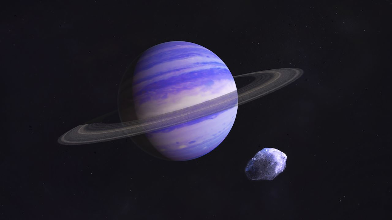 This is an artist's illustration of a Neptune-type exoplanet in the icy outer reaches of its star system. It could look something like a large, newly discovered gas giant that takes about 20 years to orbit a star 11 light years away from Earth.
