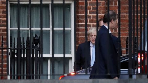 Britain's Prime Minister Boris Johnson leaves from the rear of 10 Downing Street in central London on Thursday.