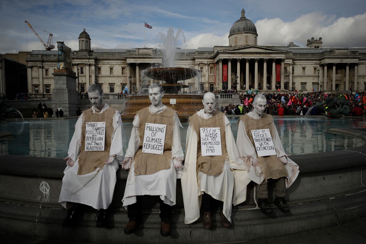 Extinction Rebellion climate change protesters demonstrate during a rally in Trafalgar Square in London on Wednesday, October 16. Climate protesters in London have kept up their campaign <a href="https://www.cnn.com/2019/10/15/uk/extinction-rebellion-london-ban-gbr-intl/index.html" target="_blank">despite being ousted by a police order</a> from their Trafalgar Square encampment on Monday. 