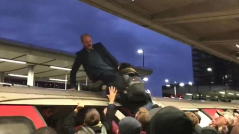 See Extinction Rebellion protesters dragged off London tube