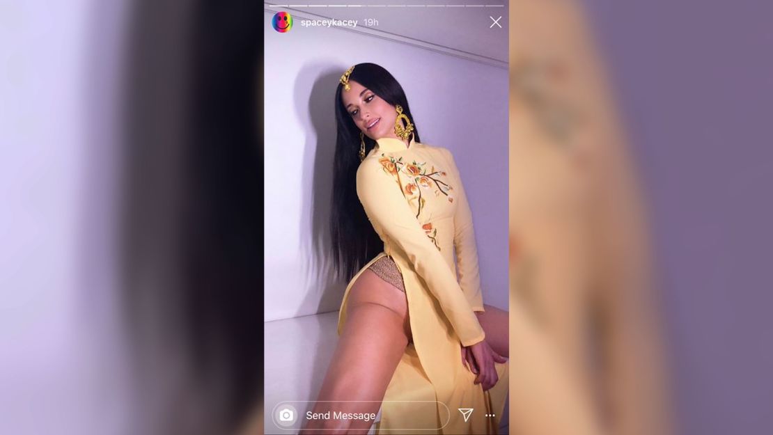 Kacey Musgraves is receiving backlash after posting photos on Instagram wearing a traditional Vietnamese ao dai dress.
