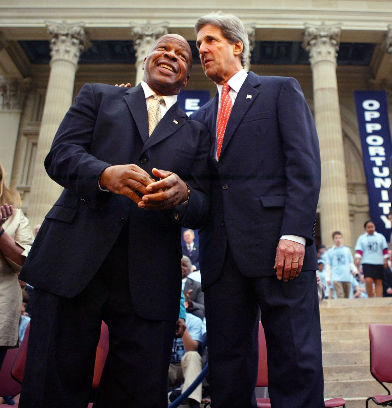 US Sen. John Kerry chats with Cummings during a ceremony in Topeka, Kansas, commemorating the 50th anniversary of Brown v. Board of Education.