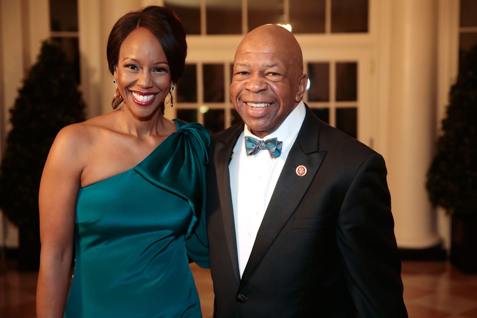 Cummings and his wife, Maya Rockeymoore Cummings, arrive at a state dinner hosted by Obama at the White House in February 2014.