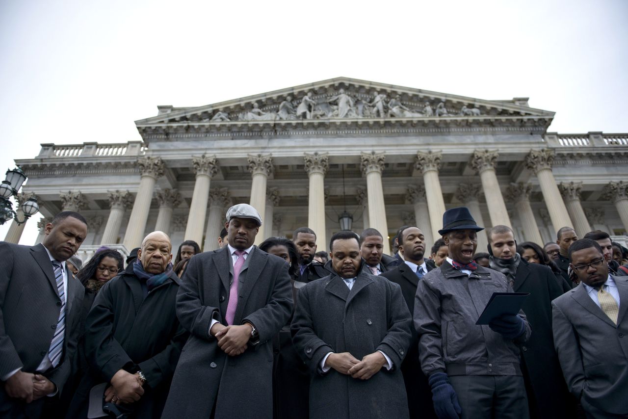 Cummings takes part in a walk-out outside the House of Representatives in December 2014. People gathered to protest the Eric Garner and Michael Brown grand jury decisions, which did not bring charges against the police officers involved in their deaths.
