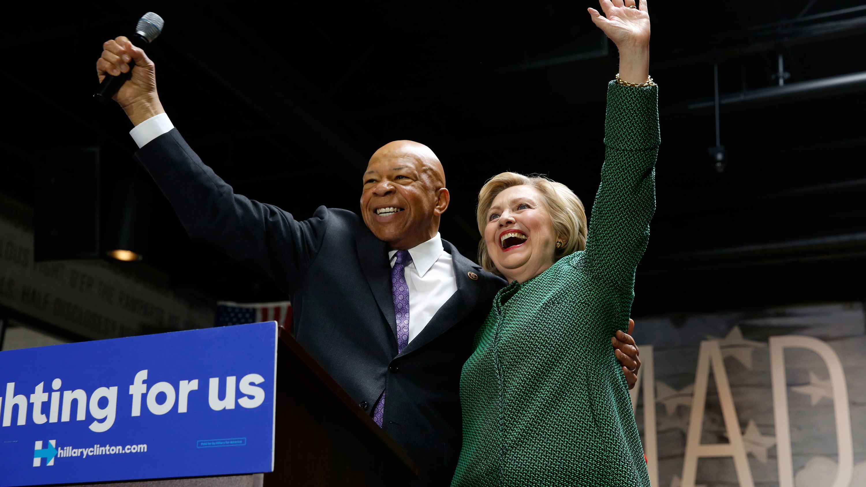 Cummings stands with Democratic presidential candidate Hillary Clinton after endorsing her at an event in Baltimore in April 2016.