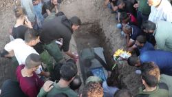 Syrian Kurds bury their dead amid the Turkish offensive