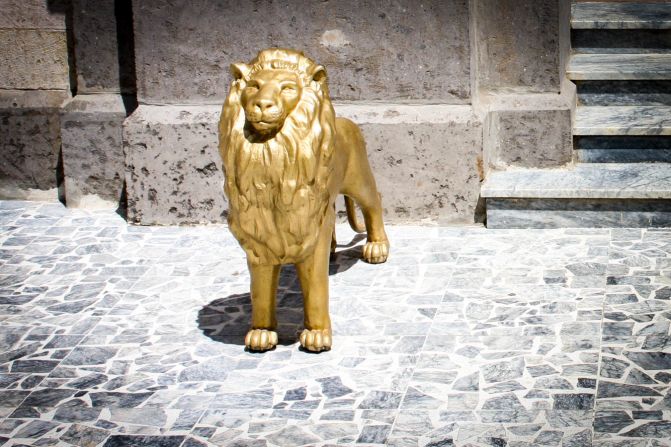 <strong>Guard cat: </strong>A golden Lion of Judah watching over the entrance to the Throne House.
