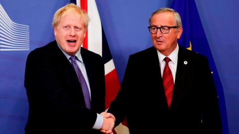 British Prime Minister Boris Johnson (L) shakes hands with President of the European Commission Jean-Claude Juncker on October 17, 2019.