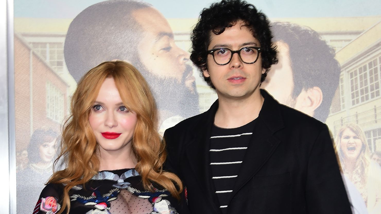 Christina Hendricks arrives with Geoffrey Arend for the world premiere of the film "Fist Fight" in Los Angeles, California, on February 13, 2017. 