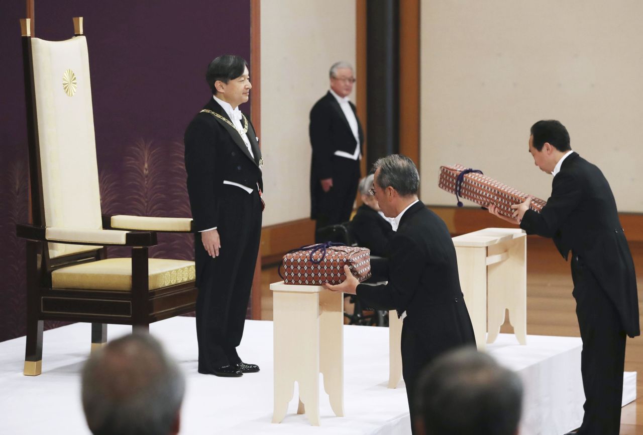 Emperor Naruhito inherits the imperial regalia at a ceremony at the Imperial Palace in Tokyo in May.