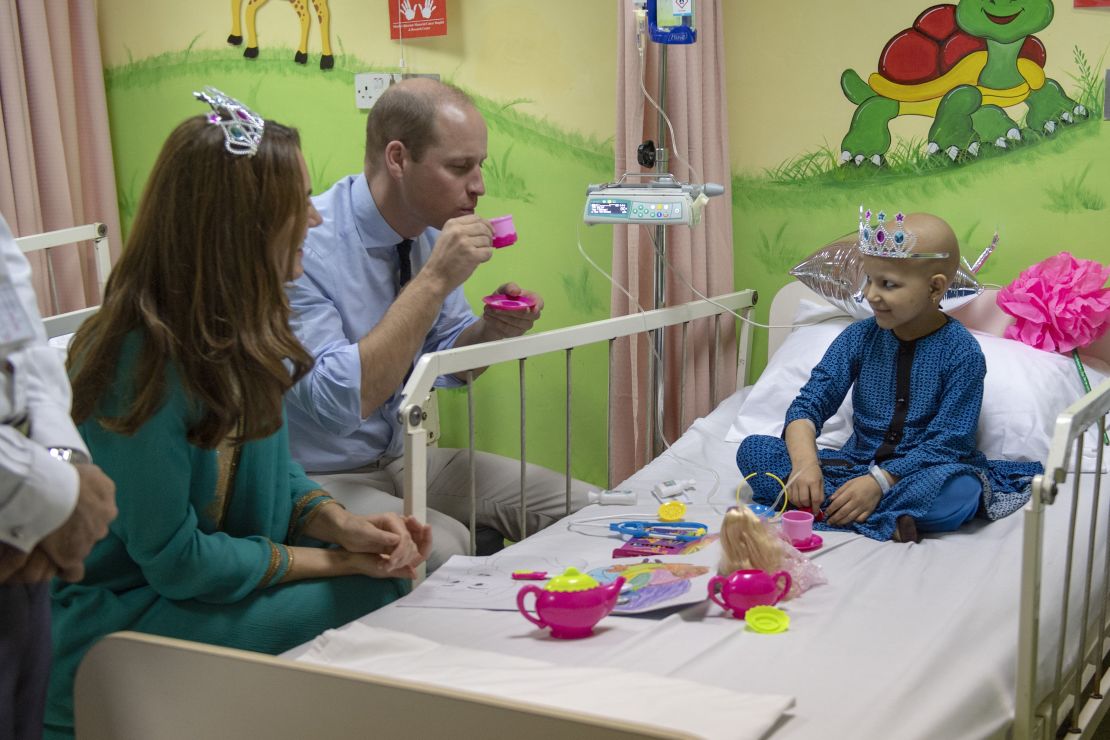William joined a tea party with cancer patient Wafia Remain, 7, during the couple's visit to Shaukat Khanum Memorial Cancer Hospital.
