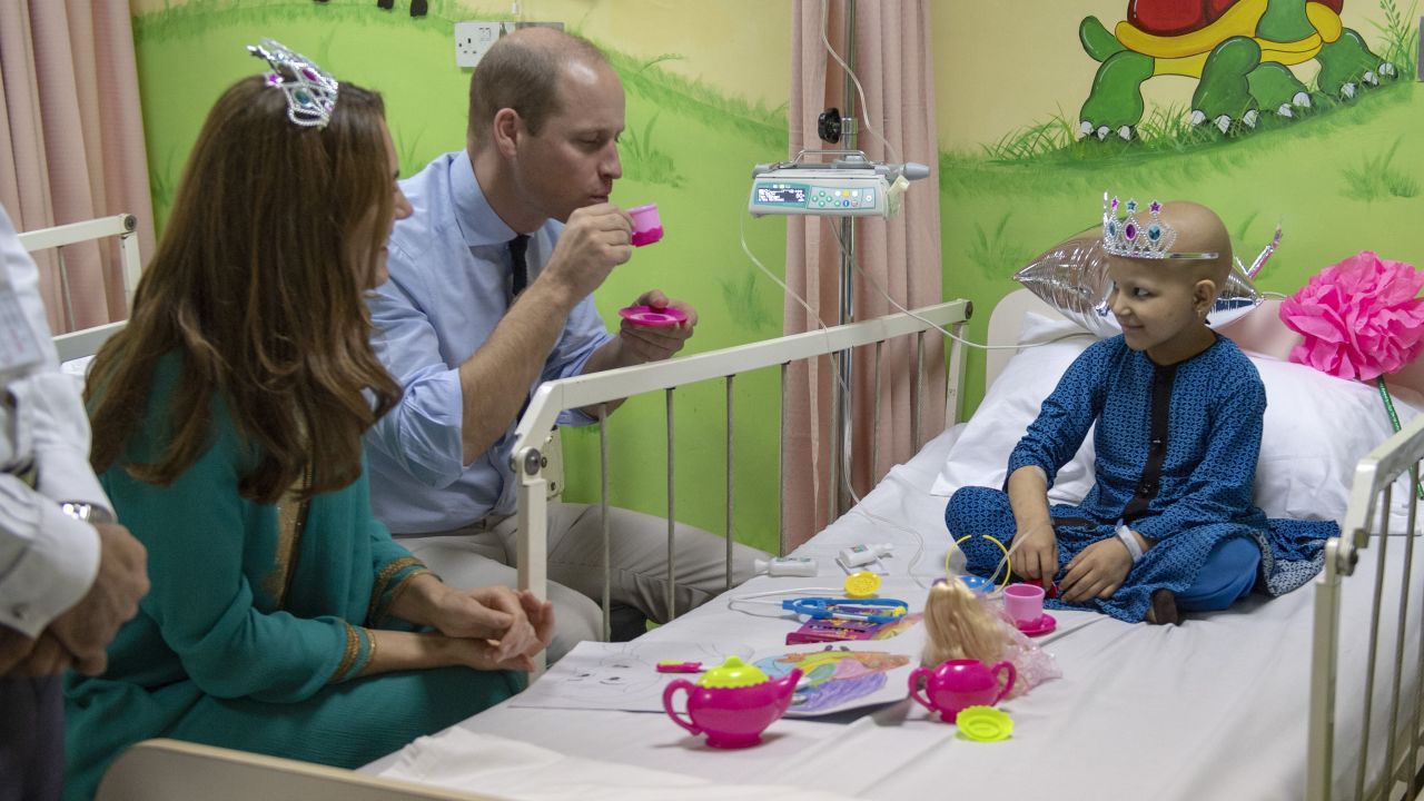 William joined a tea party with cancer patient Wafia Remain, 7, during the couple's visit to Shaukat Khanum Memorial Cancer Hospital.