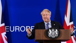 Britain's Prime Minister Boris Johnson addresses a news conference in Brussels on October 17, 2019.