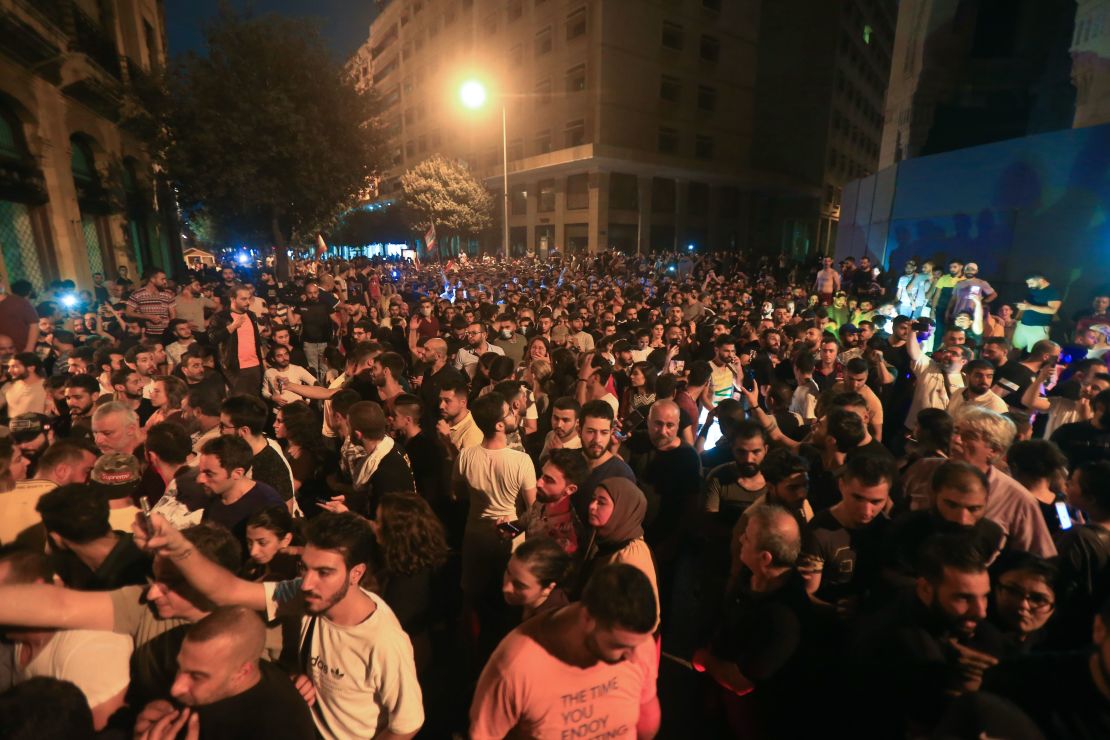 Demonstrators gather outside the government palace in Beirut. 