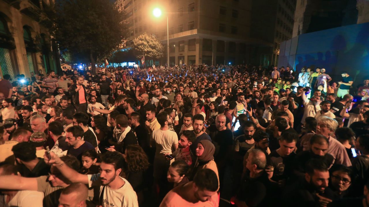 Demonstrators gather outside the government palace in Beirut.