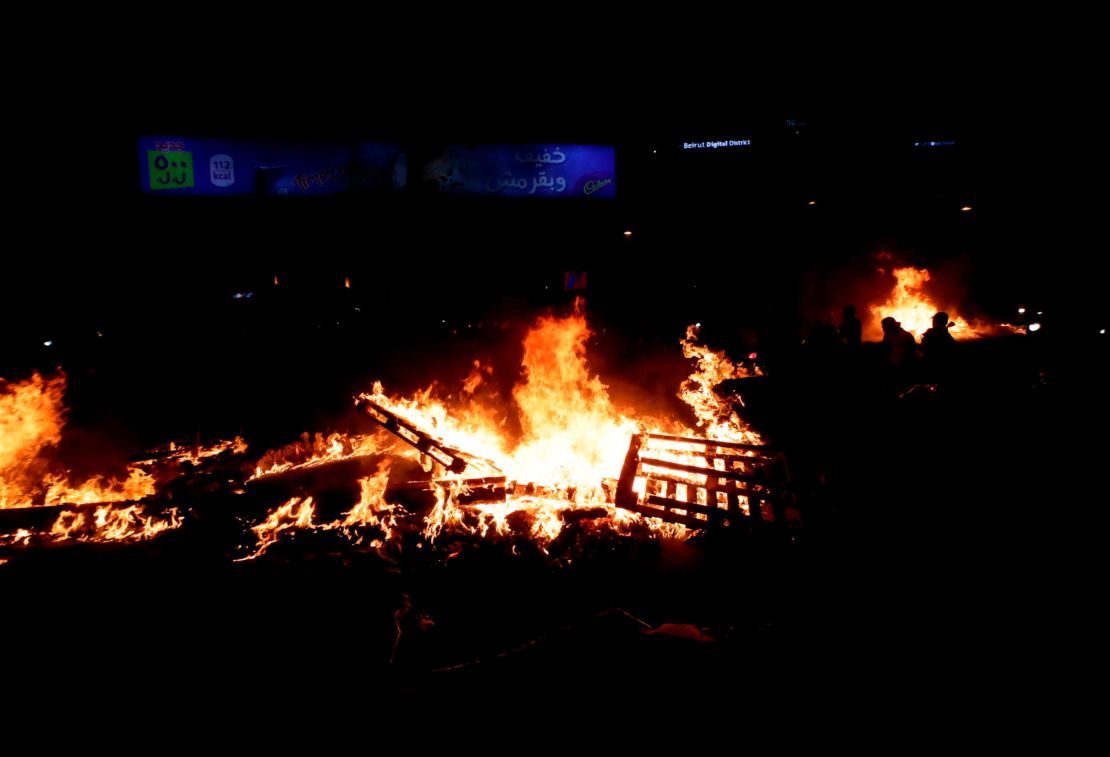 Lebanese demonstrators burn wood and debris in the capital Beirut. 