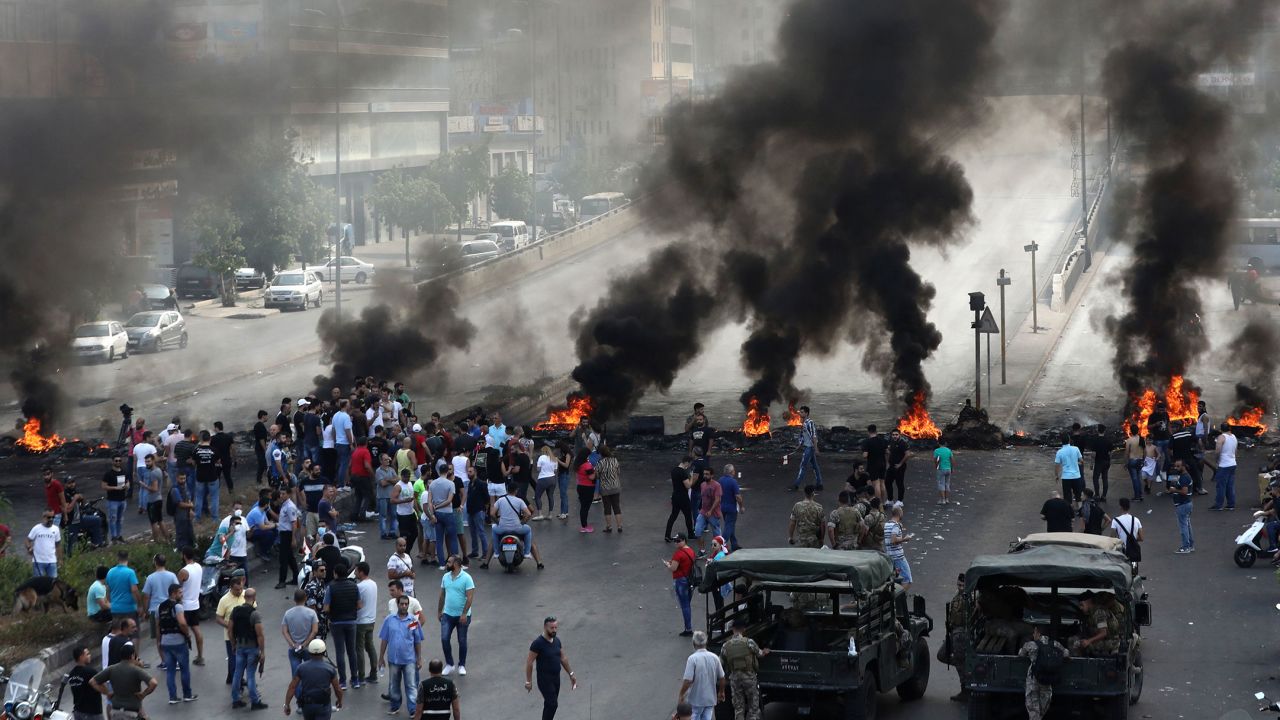 A protest against economic conditions in the industrial zone of Dora on the northern outskirts of Beirut, on October 18.