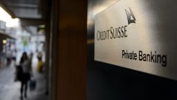 A sign of a Credit Suisse private banking branch is seen on May 19, 2014  in Geneva, Switzerland. The United States hit Credit Suisse with criminal charges for helping rich Americans evade taxes, ahead of an expected guilty plea by the giant Swiss bank and a $2.6 billion fine.  AFP PHOTO / FABRICE COFFRINI        (Photo credit should read FABRICE COFFRINI/AFP/Getty Images)