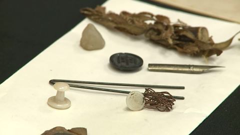 The time capsule also held little things like buttons and a pebble.