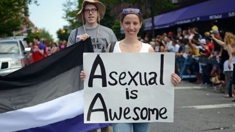 A woman holds a sign during the Queens Pride Parade in New York on June 2, 2013.