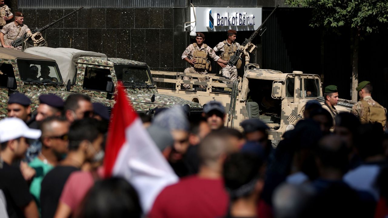 Lebanese soldiers stand guard in Beirut's financial district on October 19, 2019.