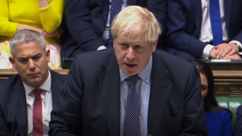 Britain's Prime Minister Boris Johnson delivers a statement to lawmakers inside the House of Commons in London, Saturday Oct. 19, 2019. At a rare weekend sitting of Parliament, Johnson implored legislators to ratify the Brexit deal he struck this week with the other 27 EU leaders. Secretary of State for Exiting the European Union, Stephen Barclay, sitting at left. (House of Commons via AP)