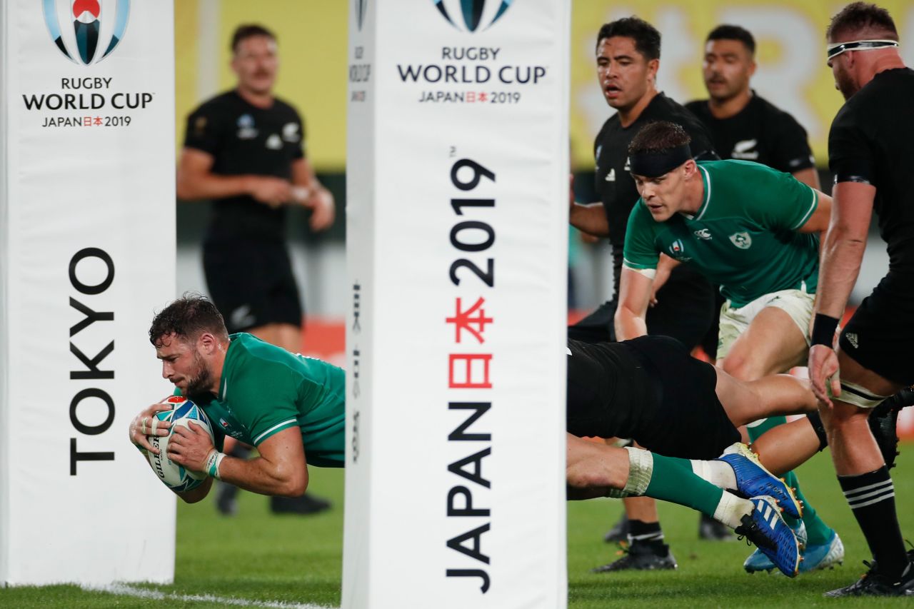 Ireland's centre Robbie Henshaw scores a try.