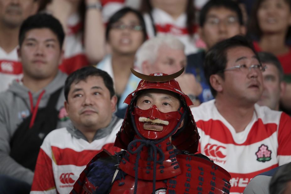 Fans react during the Rugby World Cup quarterfinal match at Tokyo Stadium between Japan and South Africa.