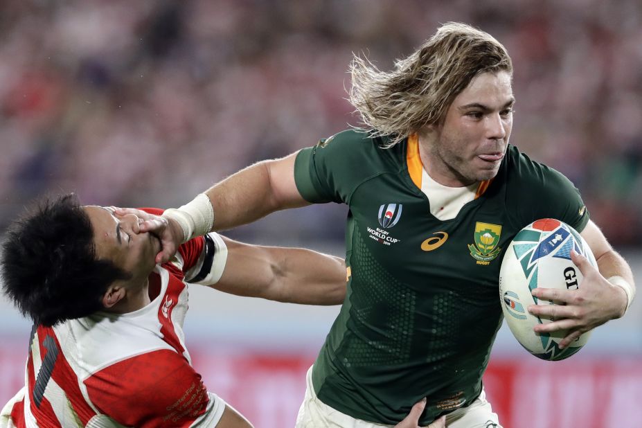South Africa's Faf de Klerk runs to score a try during the Rugby World Cup quarterfinal match at Tokyo Stadium between Japan and the Springboks. South Africa won 26-3.