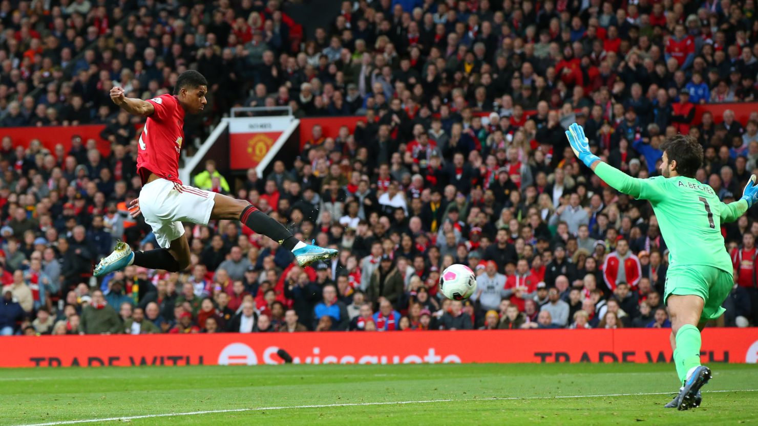 Marcus Rashford of Manchester United scores during the Premier League clash between United and Liverpool at Old Trafford on Sunday.