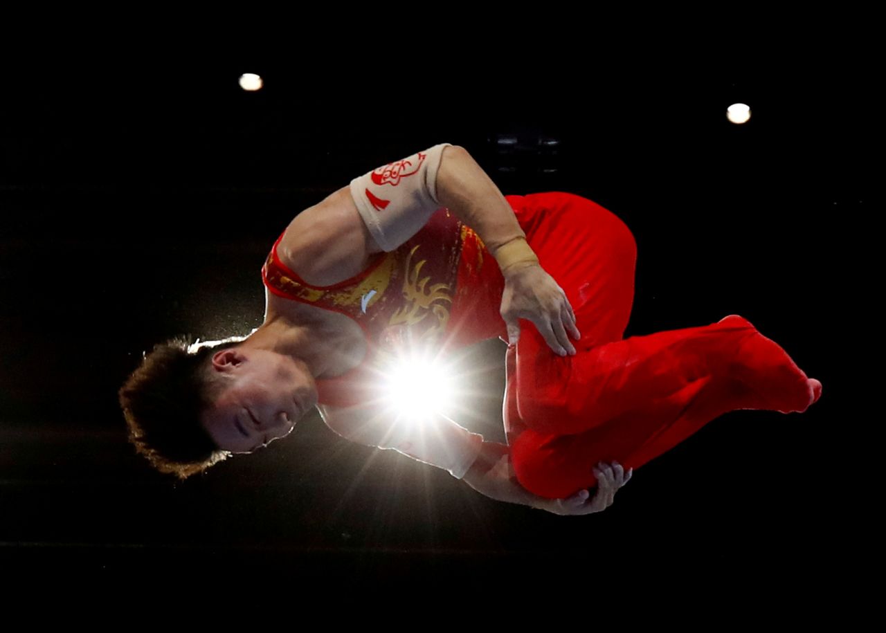 China's Wei Sun competes in the Men's Parallel Bars final during the c