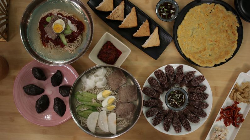 <strong>On offer:</strong> Pyongyang Pub's menu features North Korean foods such as rice with marinated tofu, sweet rice sundaes, potato rice cakes and sweetcorn pancakes.