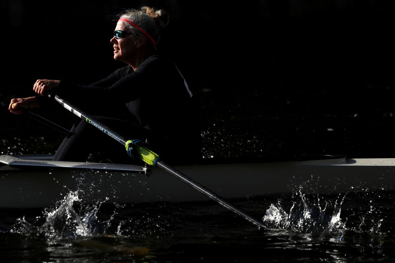 A member of the Twin Donut Rowing Club competes in the Directors' Challenge Women's Quads division during the 55th Head of the Charles Regatta on October 20 in Boston, Massachusetts.