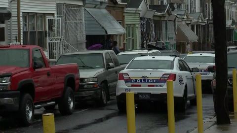 A 2-year-old girl was killed and two adults wounded when someone fired into a house Sunday, police said.
