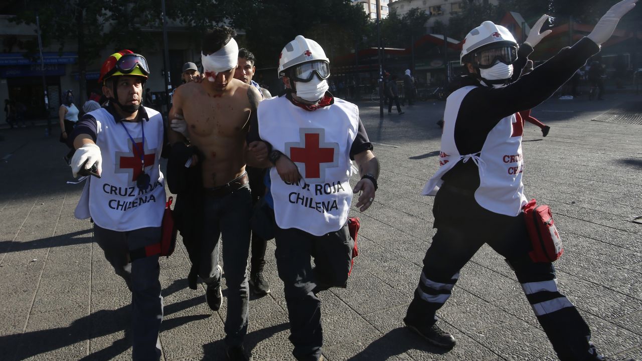  A person is injured during the protest on October 20, 2019 in Santiago, Chile.